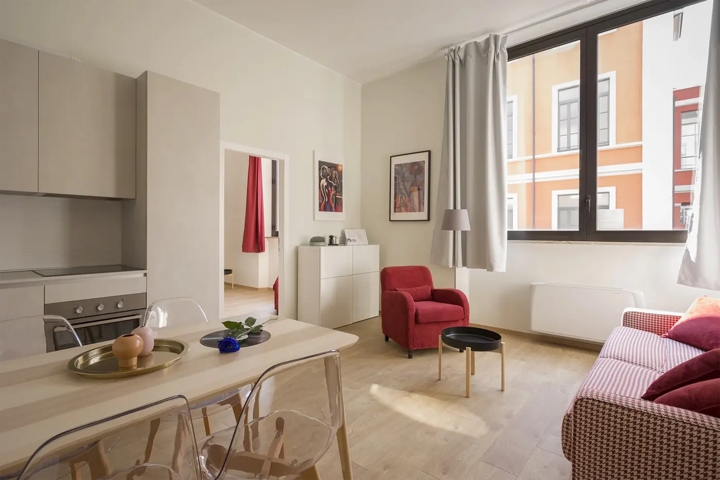 Lark Suite: private sitting room with armchair and dining table